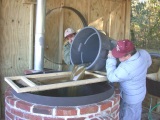 Ed Nix & Roy Allen pouring juice - Sugarcane Operations - Doug Croley (Havana, Florida)