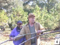 4--CroleyD_(WHO_2002)_(96)_Feeding_mill-Bill_Smith-visitor_from_Kenya